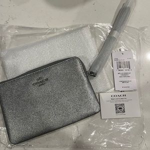Coach silver metallic wristlet